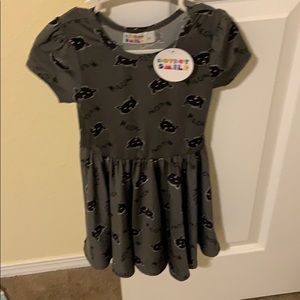 Dot dot smile twirl dress with black cat faces